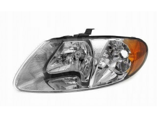 Chrysler voyager dodge caravan 00- reflektor lampa Левый 