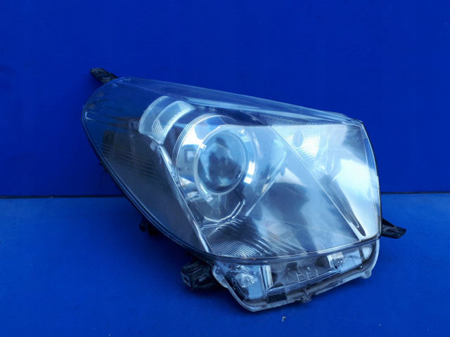 Toyota iq 2008- 08-15 reflektor lampa правая ciemna Правое 