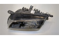 Фара передняя  Mazda 626 1997-2001 левая 