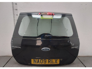 Замок багажника  Ford Fusion 2002-2012       