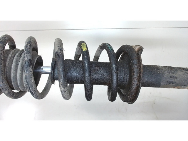 Стойка амортизатора  Mitsubishi Colt 1996-2004 MR244447, MB871085    1.3  бензин