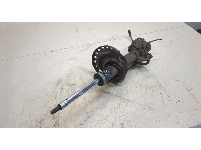 Стойка амортизатора  Nissan Micra K12E 2003-2010      1.2  бензин