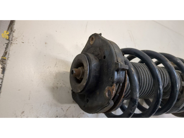 Стойка амортизатора  Volkswagen Caddy 2004-2010 1T0413031HQ, 1K0411105EH     