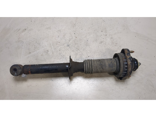 Стойка амортизатора  Mitsubishi Colt 1996-2004 MR244447, MB871085    1.3  бензин