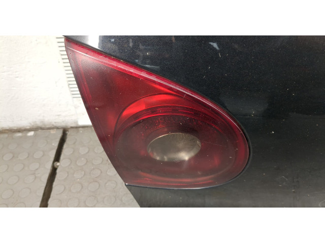Замок багажника  Volkswagen Golf 5 2003-2009       
