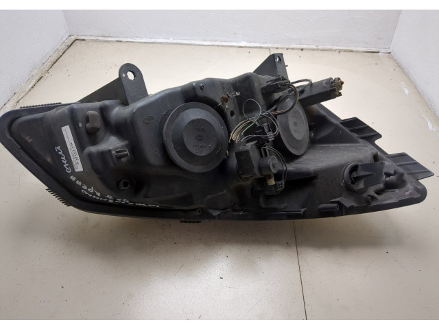Фара передняя  Renault Scenic 2003-2009 левая 