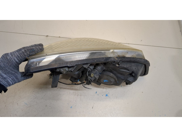 Фара передняя  Renault Scenic 2003-2009 левая 