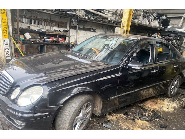 Стойка амортизатора  Mercedes E W211 2002-2009      2.1  дизель