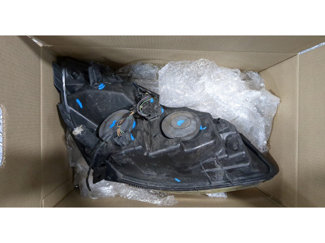 Фара передняя  Renault Scenic 2003-2009 левая 