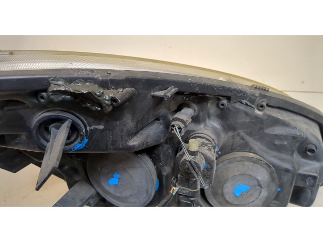 Фара передняя  Renault Scenic 2003-2009 левая 