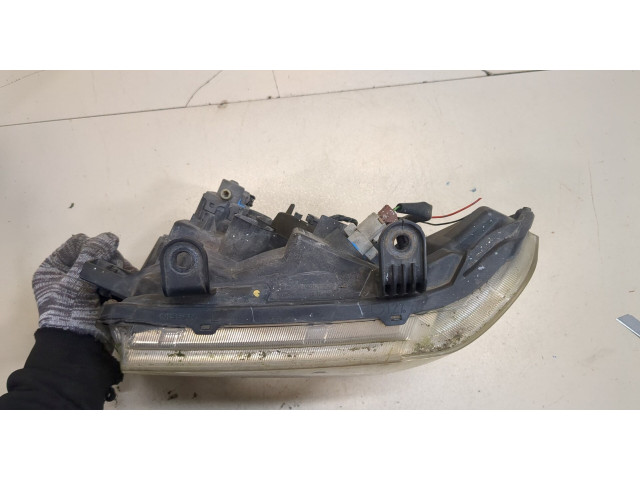 Фара передняя  Nissan Pathfinder 2004-2014 левая 