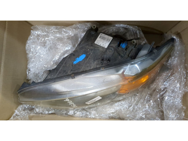Фара передняя  Mitsubishi Colt 2008-2012 левая 