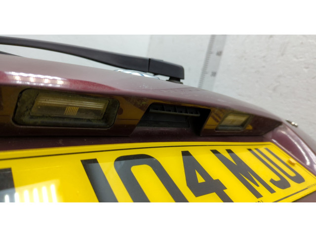 Замок багажника  Nissan Almera N16 2000-2006       