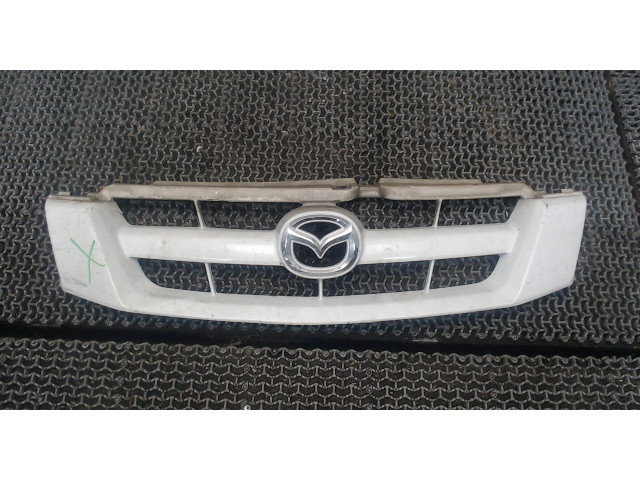 Решетка радиатора  Mazda Tribute 2001-2007          2.3 EF92-50-711AA