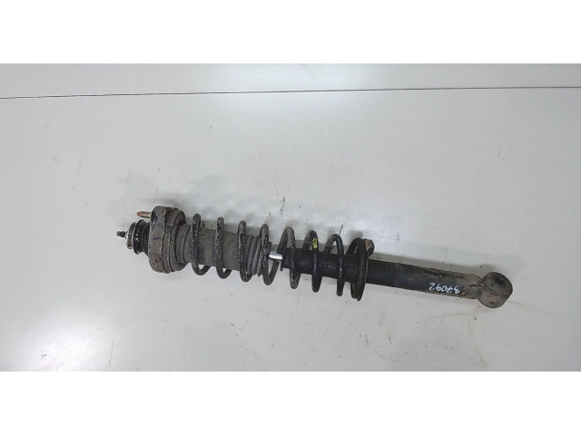 Стойка амортизатора  Mitsubishi Colt 1996-2004 MR244447, MB871085    1.3  бензин