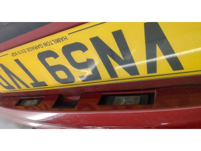 Замок багажника  Nissan Note E11 2006-2013       