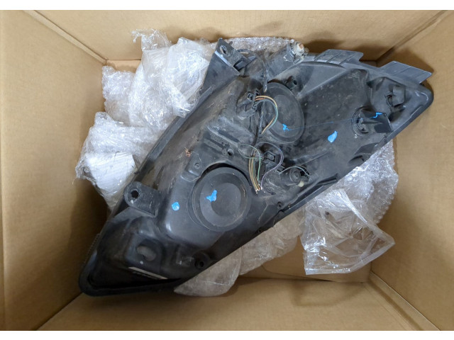 Фара передняя  Renault Scenic 2003-2009 левая 