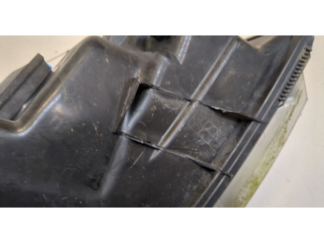 Фара передняя  Renault Scenic 2003-2009 левая 