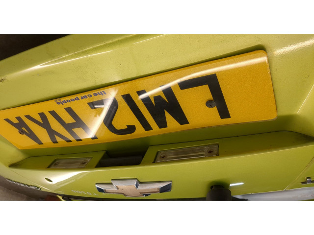 Замок багажника  Chevrolet Spark 2009-2016       