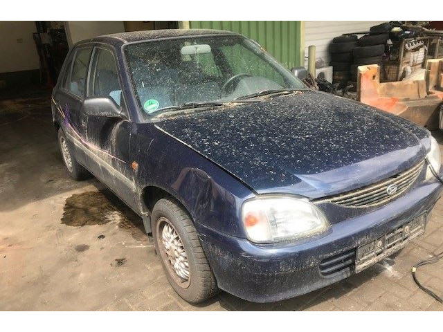 Бампер  Daihatsu Charade 1993-2000 задний    