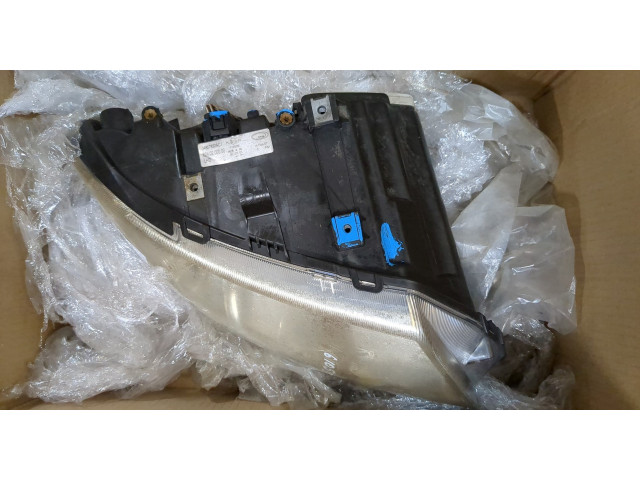 Фара передняя  Chrysler Voyager 2001-2007 правая 