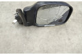 Zpětné zrcátko  Opel Frontera B 2002  E1010557  