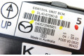 Pojistková skříňka Модуль кузова DL4067560B, DL4067560B   Mazda 2 2009