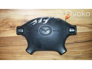 Подушка безопасности водителя T93065A   Mazda 323