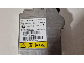 Блок подушек безопасности 9184432, 0285010070   BMW X1 E84