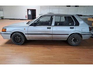 Zpětné zrcátko  Nissan Sunny 1990    