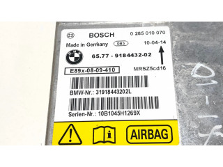Блок подушек безопасности 9184432, 0285010070   BMW X1 E84