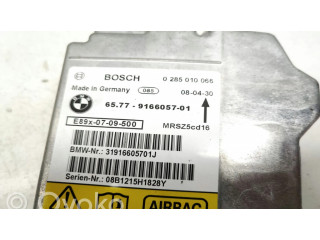 Блок подушек безопасности 0285010066, 9166057   BMW 3 E92 E93