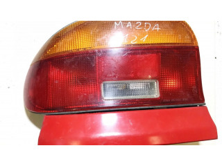 Задний фонарь левый сзади     Mazda 121   1992-1995 года