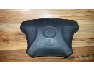 Подушка безопасности водителя T93059A   Mazda 323