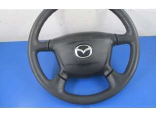 Volant Mazda 323 2003   