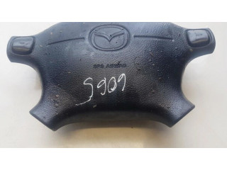 Подушка безопасности водителя T93065A, BG2A57K00   Mazda 323