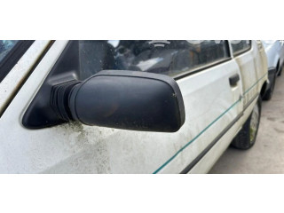 Zpětné zrcátko  Peugeot 205 1990    