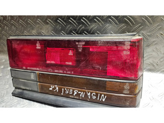 Задний фонарь правый 013056, 003843    Nissan Cherry N12   1982-1986 года