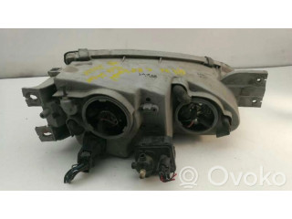 Přední světlo Сзади 1010495, 9210127XXX   Hyundai Coupe 1998