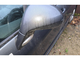 Zpětné zrcátko  Peugeot 308 SW  2009  0306040, 0308094  