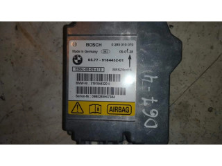 Блок подушек безопасности 0285010070, D67-4   BMW 3 E92 E93