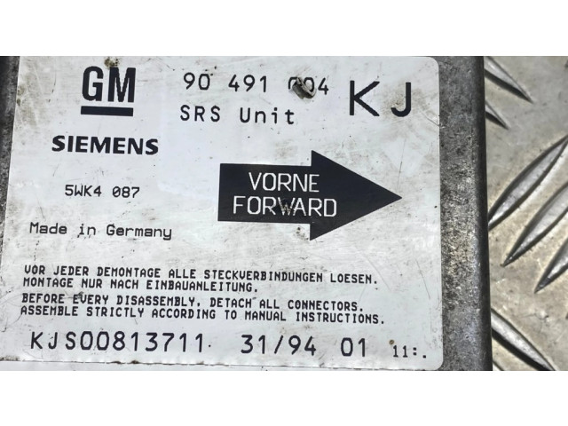 Блок подушек безопасности 90491004, KJS00813711   Opel Omega B1