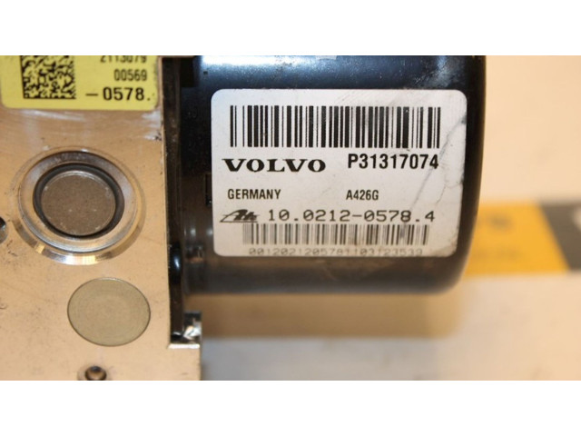Jednotka ABS 31317074, 10021205784   Volvo V40 2013
