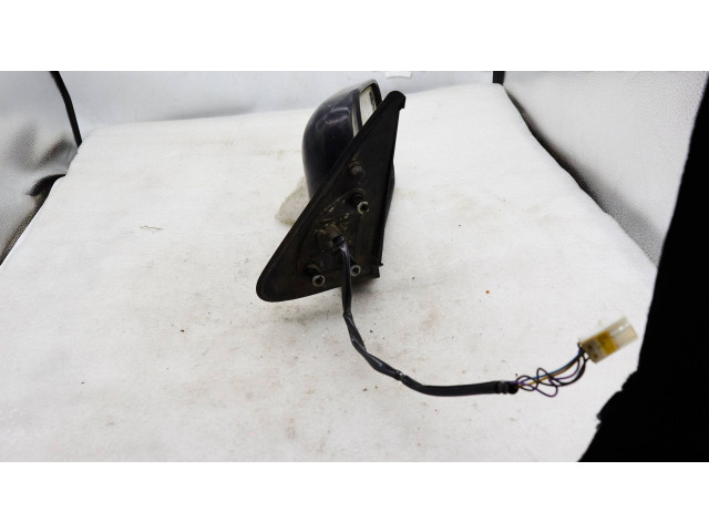 Zpětné zrcátko  Nissan Navara D22 2002  e4012089, e4022089  
