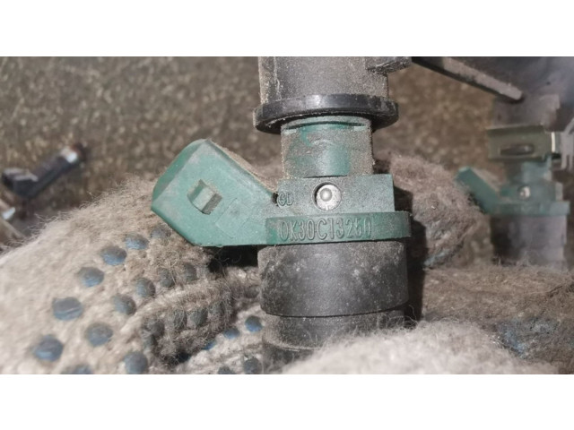 Vstřikovač 0K30C13250   KIA Rio  pro benzínový motor 1.4  