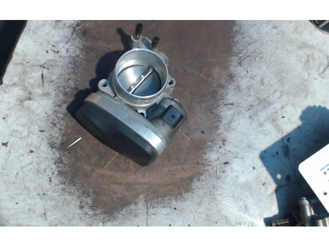 Дроссель     06F133062, 06F133062    Volkswagen Touran I 