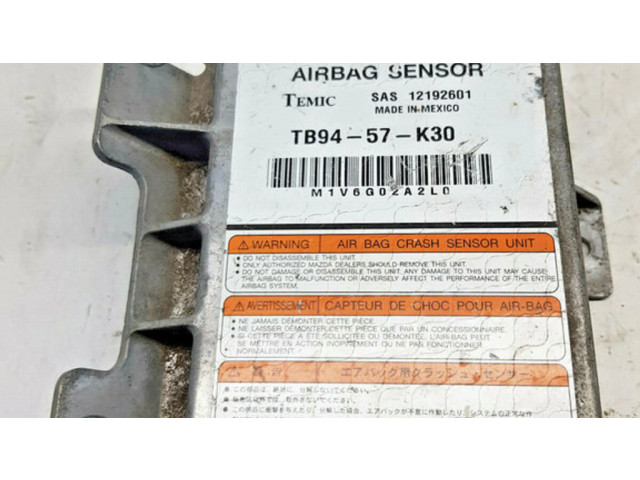 Блок подушек безопасности TB9457K30, nr1380   Mazda 323