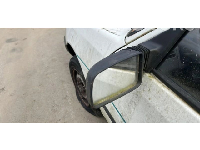 Zpětné zrcátko  Peugeot 205 1990    