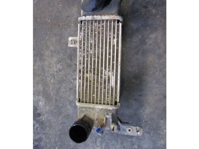 Интеркулер     Mazda 323 F 