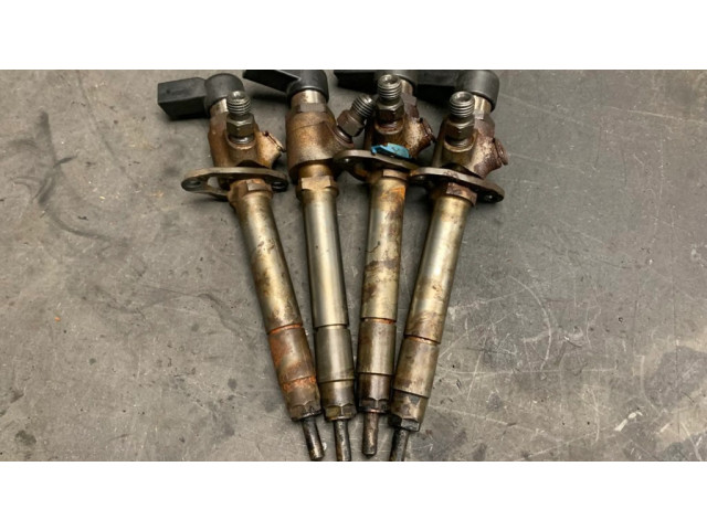 Vstřikovač 5U3Q9K546   Jaguar XF X250  pro naftový motor 2.7  